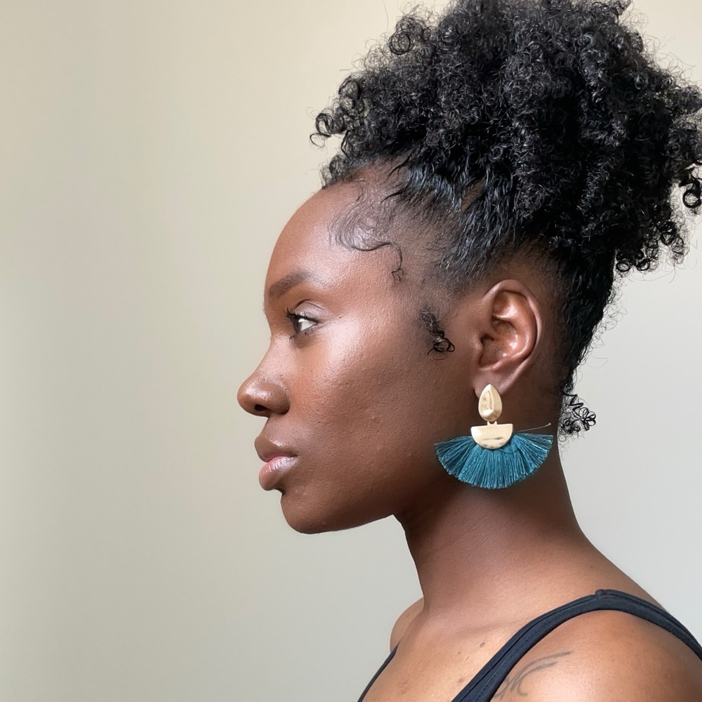 Contemporary style green fringe earrings with gold details